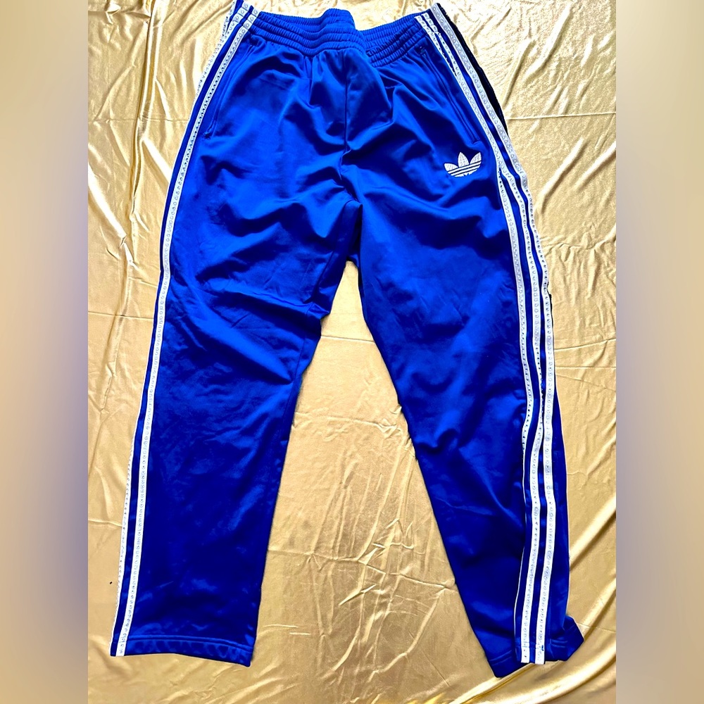 Custom Bejeweled Adidas track pants with Velcro sides and zipper ankle- blue